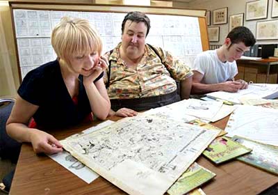 Stephen Worth assists artists at the archive.